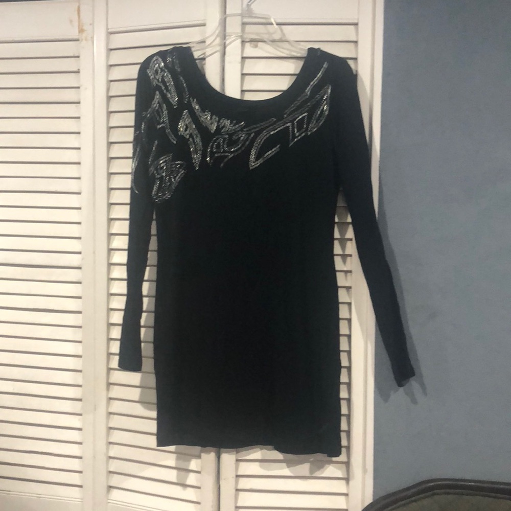 Black long sleeve dress with sequins.